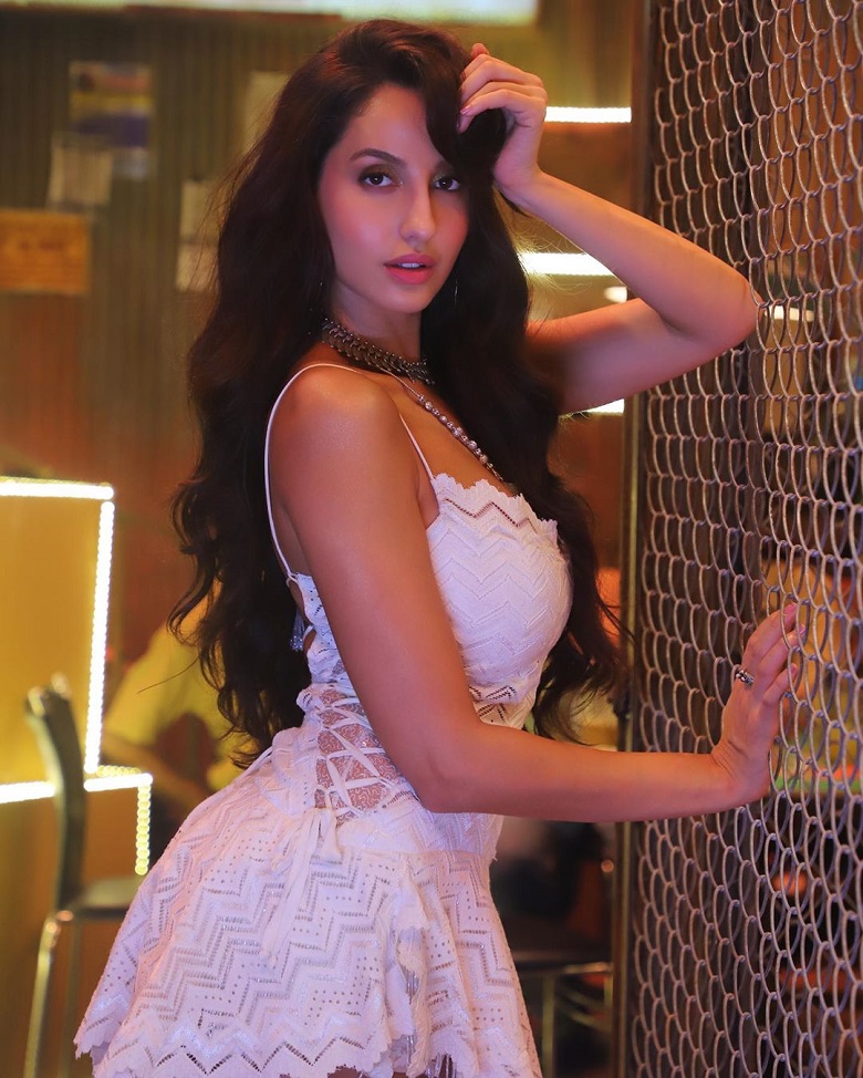 OMG! Nora Fatehi charms us in white outfits! - 3