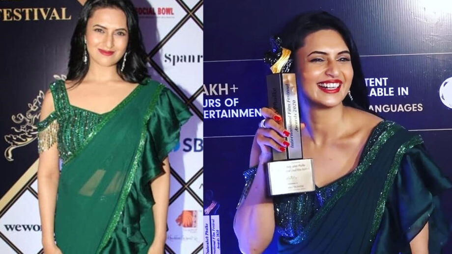 Divyanka Tripathi stuns in beautiful green saree and poses with the award