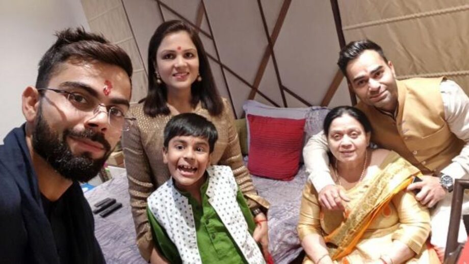 Pictures That Prove Virat Kohli Is The Perfect Family Man 3