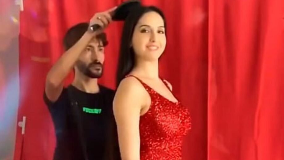 Have you this video of Nora Fatehi dancing in a hot red body-hugging dress?