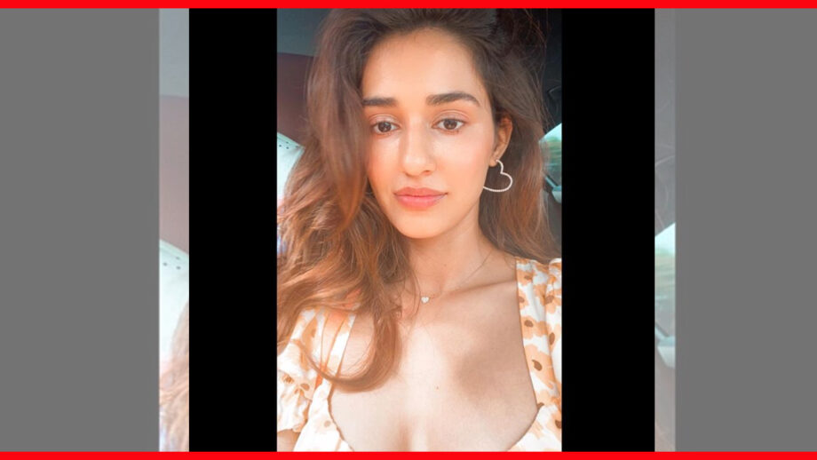 Sun-kissed glow: Fans go crazy as Disha Patani shares low neck cut dress picture