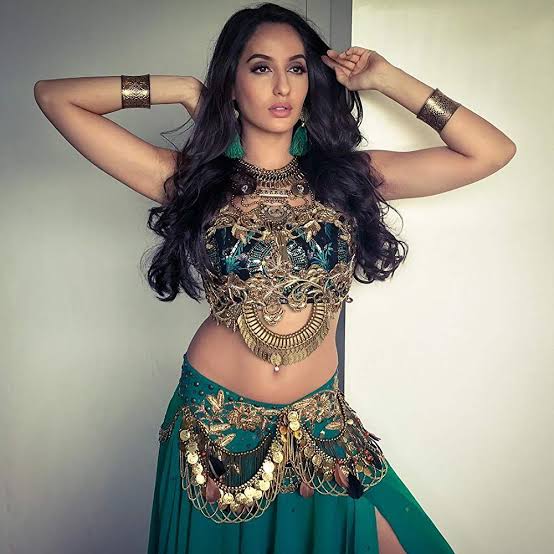 Want the perfect figure for belly dancing like Nora Fatehi? Know the secrets here 4