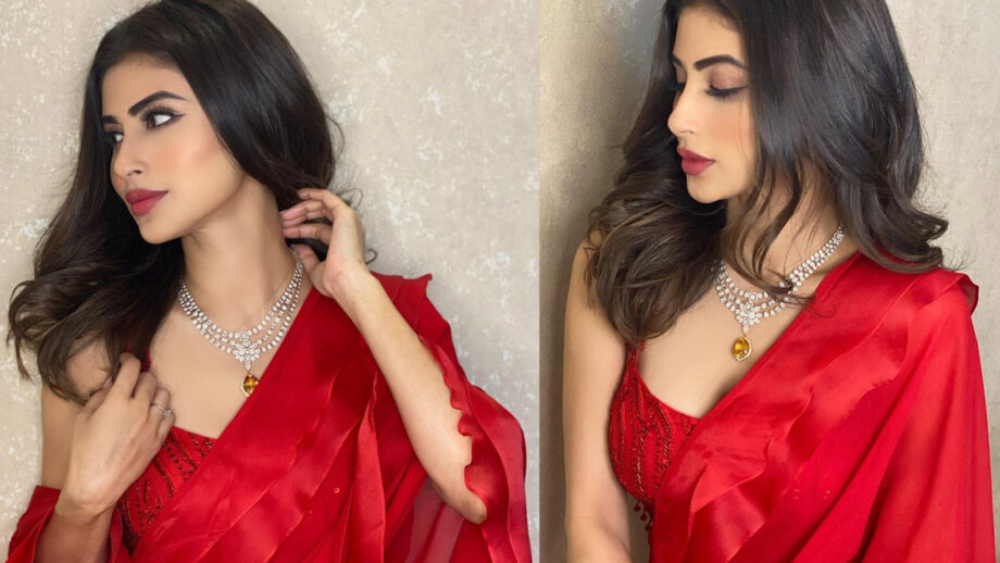 In Pics: Naagin fame Mouni Roy raises heat in a red saree