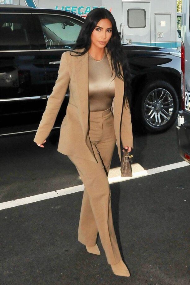 Have A Look At Kim Kardashian Hot Pantsuit Collection That will Make You Steal Them - 1