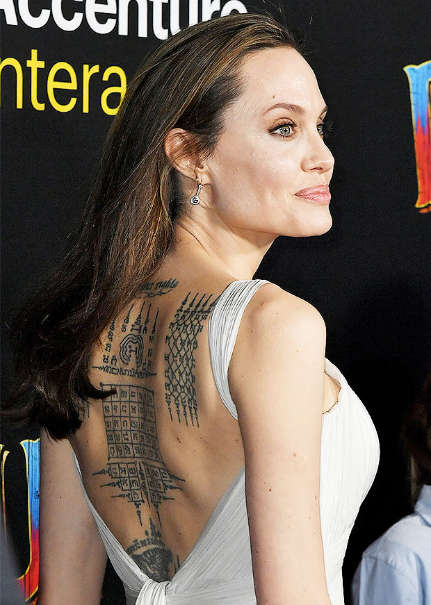 Omg! Angelina Jolie Shows Off Her Bare Sexy Back, Fans Are Feeling The Heat, See Here - 2