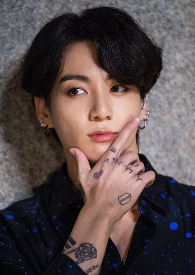 Jungkook spotted with a new tattoo on his hand that spells out ARMY   allkpop