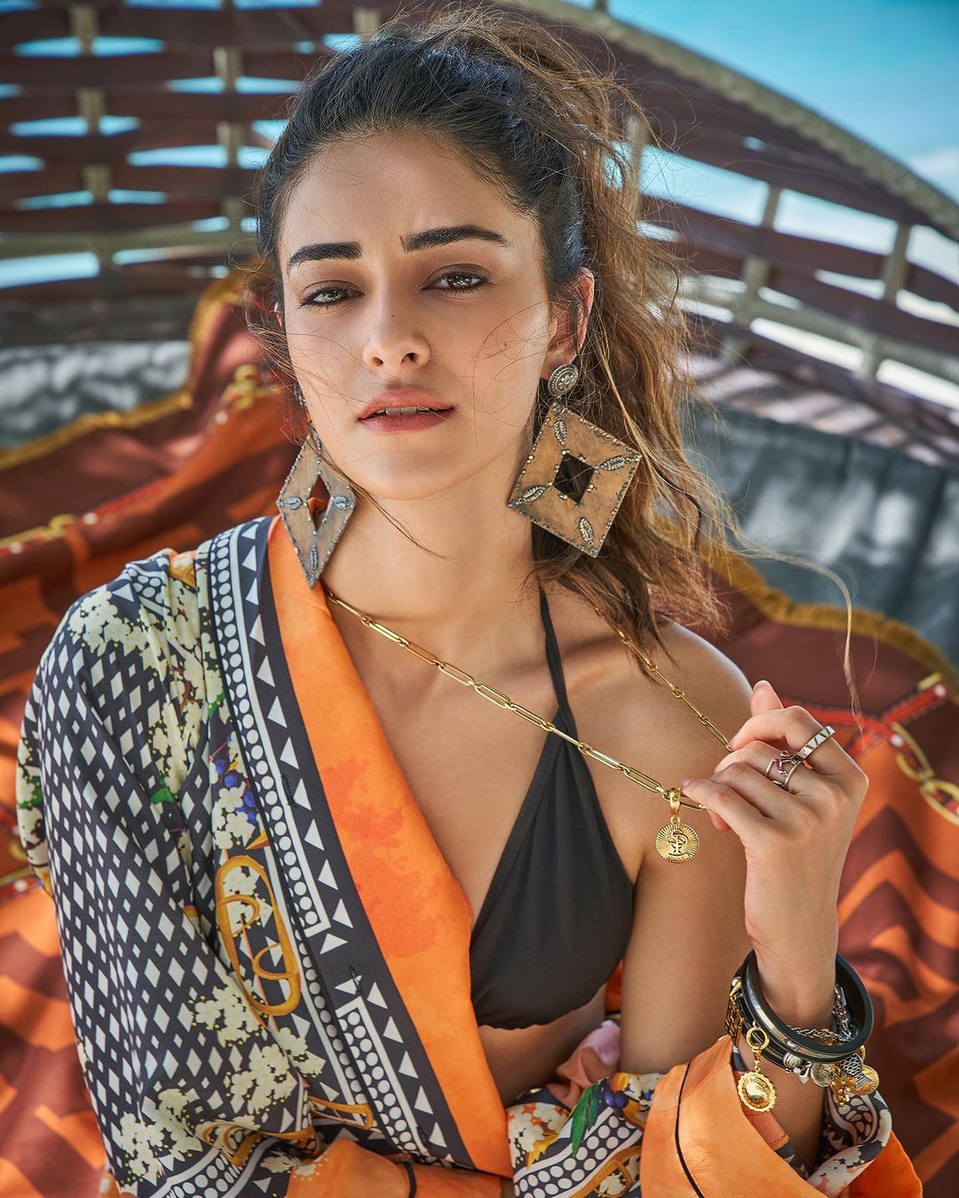 ananya panday gives bold and boho vibes in orange t shirt and black bikini check out pictures Ananya Panday offers Daring and Boho vibes in Orange T-shirt and black bikini, Take a look at Images | IWMBuzz