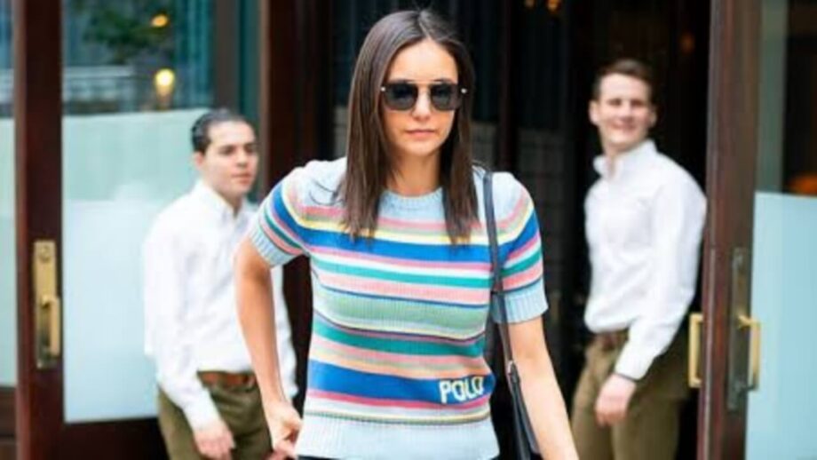 With her candy-colored pastel sweater, Nina Dobrev creates a stylish casual appearance 658873