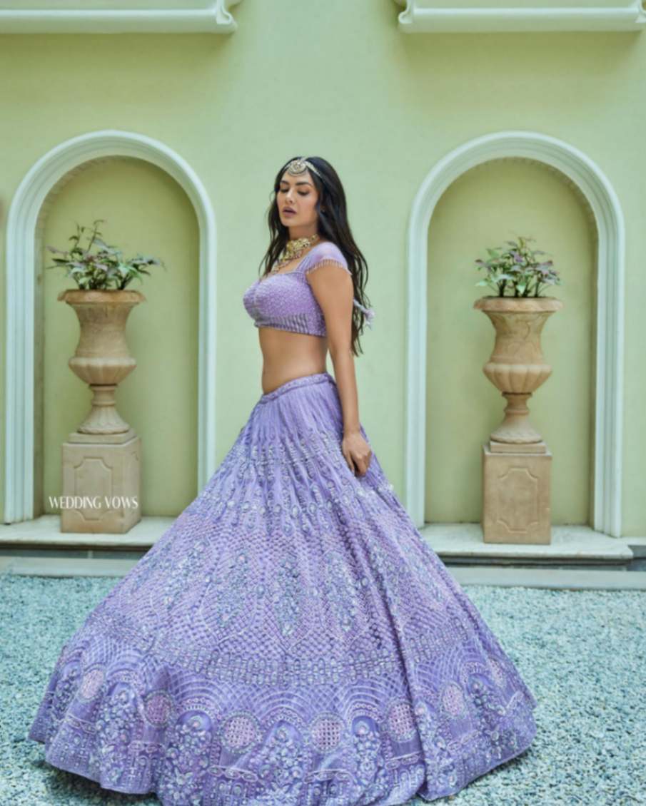 Esha Gupta Is A Fashion Icon And Rocks The Embellished Purple Lehenga Perfectly | IWMBuzz