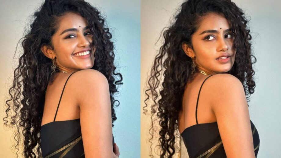 Uff Haye Garmi: Anupama Parameswaran looks sizzling hot in transparent black  saree, looks sensuous in long curly hair | IWMBuzz