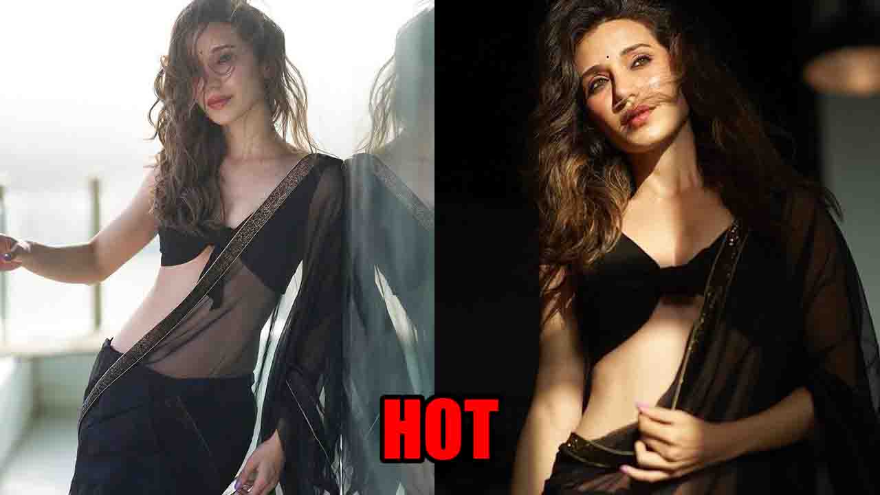 Heli Daruwala seems to be tremendous sexy in clear black saree, followers really feel the warmth