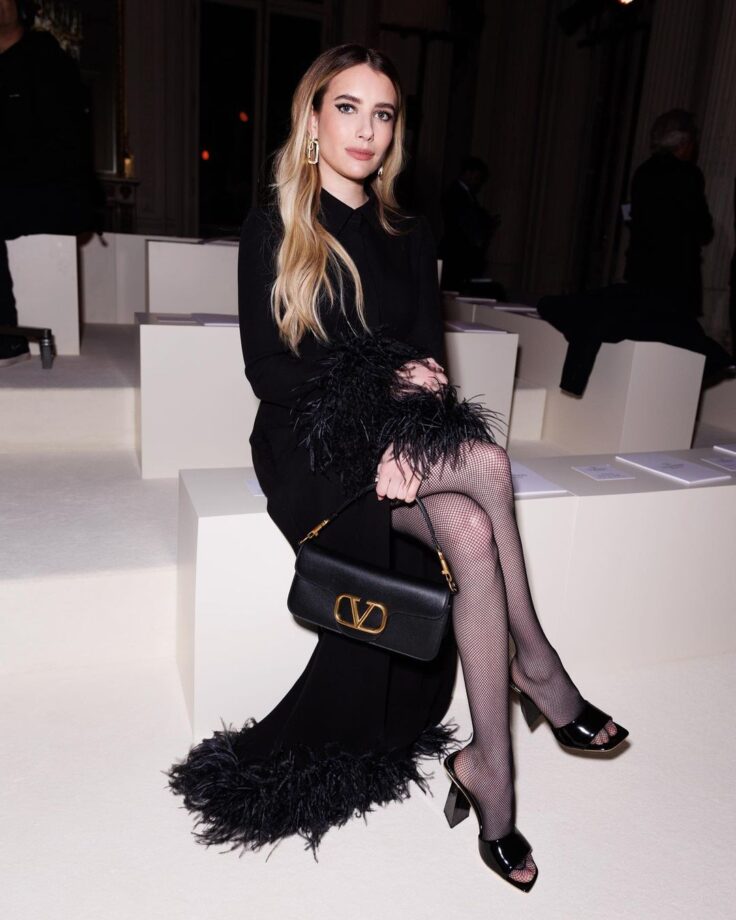Check Out: Emma Roberts Shows Her Fashion Game In A Black Thigh-High Slit Dress 781673
