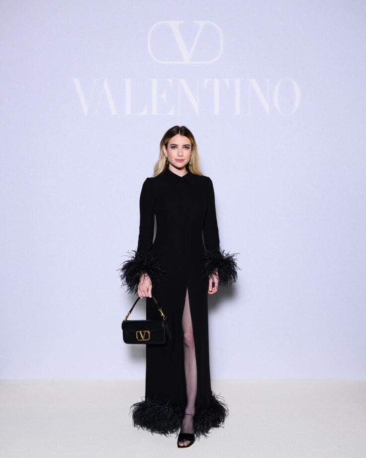 Check Out: Emma Roberts Shows Her Fashion Game In A Black Thigh-High Slit Dress 781672