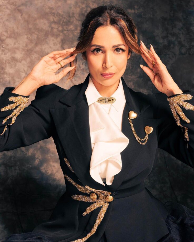 Malaika Arora prompts glam in black gold sequinned skirt suit 787708