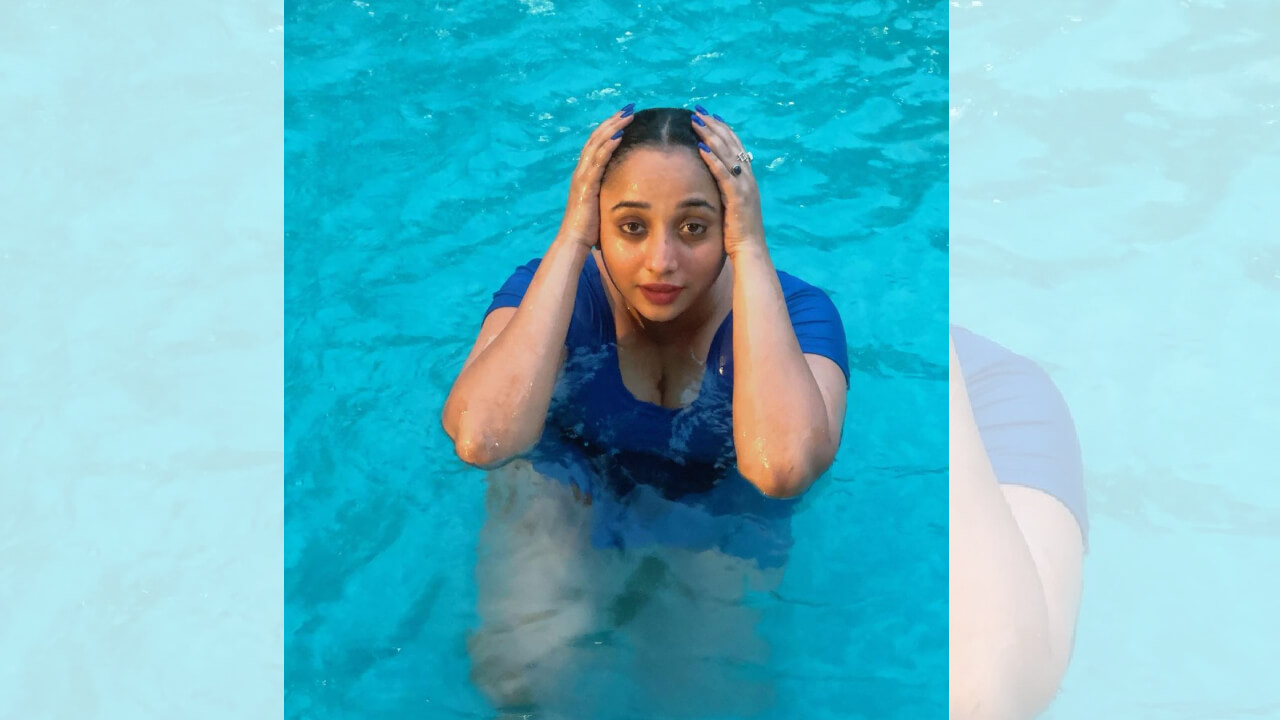 Rani Chatterjee Swims Like A Mermaid As She Enjoys Pool Time In A Blue Swimsuit