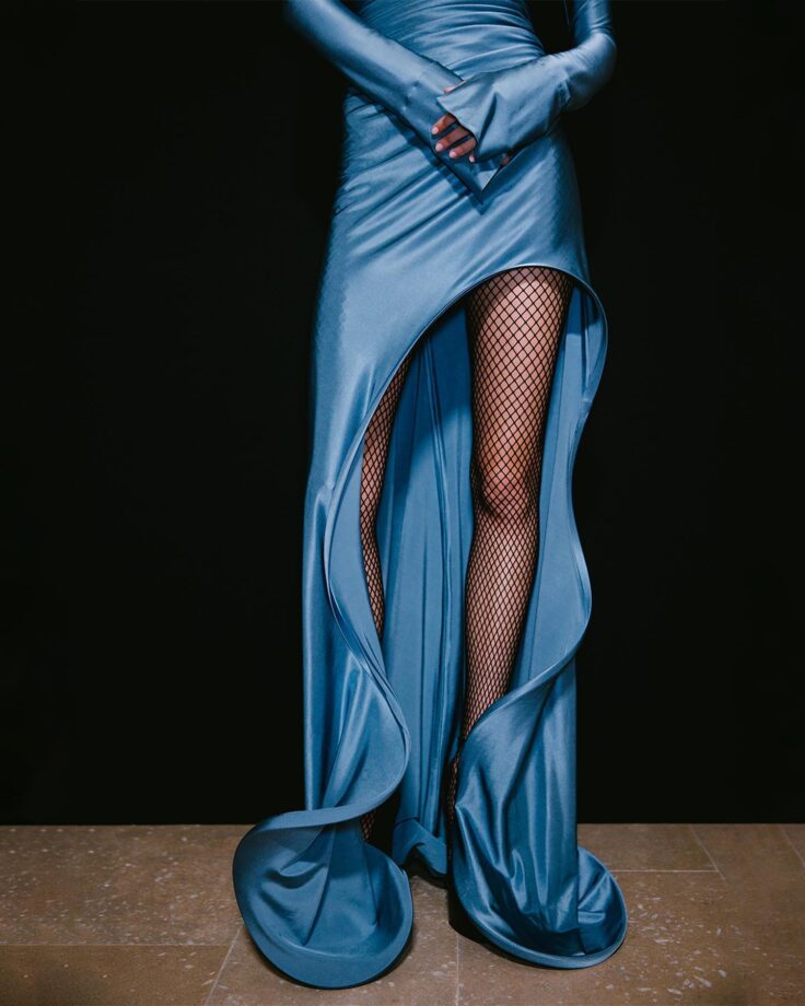 Victoria Beckham Looks Typically Chic In A Figure-Hugging Blue Satin Gown 783656