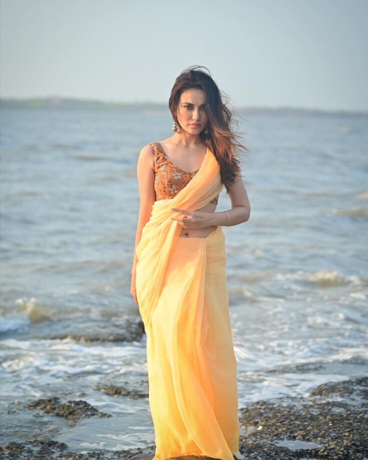 Surbhi Jyoti dazzles in see-through yellow saree, flaunts curvaceous structure with perfection 802046