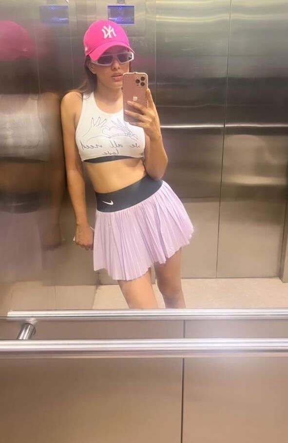 Nia Sharma is quintessential 'cutie pie' white sports bra and pink skirt, check out 811470