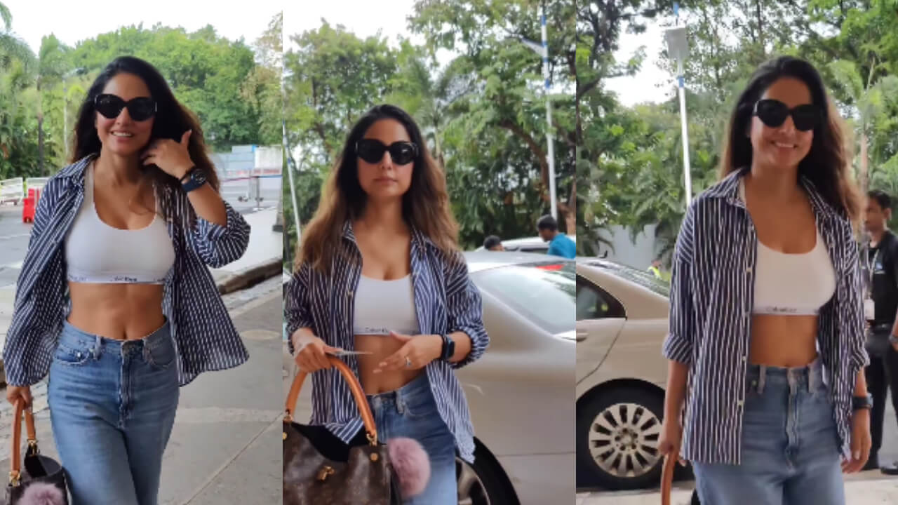 Boss Lady in action! Hina Khan stuns in striped unbuttoned shirt and baggy jeans at airport, watch 823209
