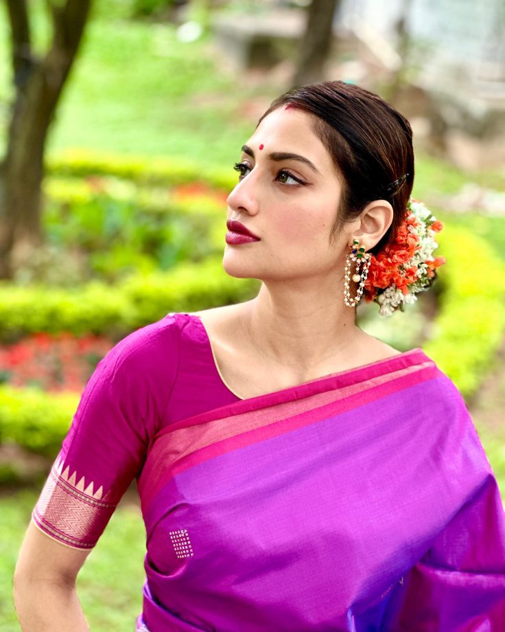 In Pics: Nusrat Jahan embraces classic South Indian fashion motifs with a saree and a floral bun 834718