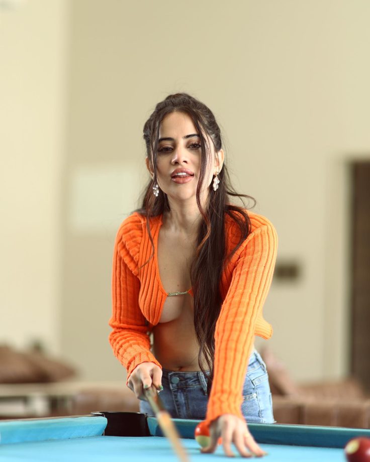 Urfi Javed takes internet by storm in preppy orange front-open crop top and denim jeans 846552