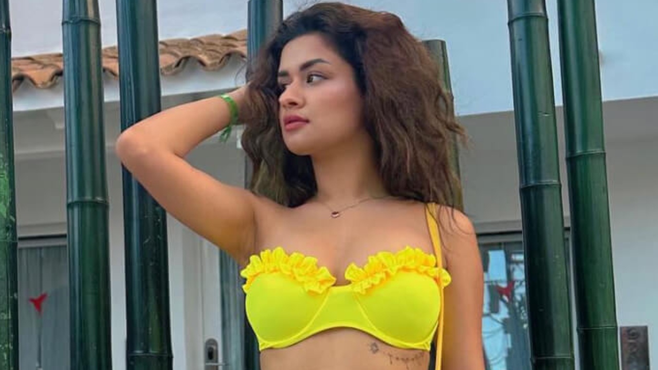 Avneet Kaur summons ‘swim’ ‘sunny’ n ‘sensuality’ in yellow bikini top and tropical wrap skirt  849827