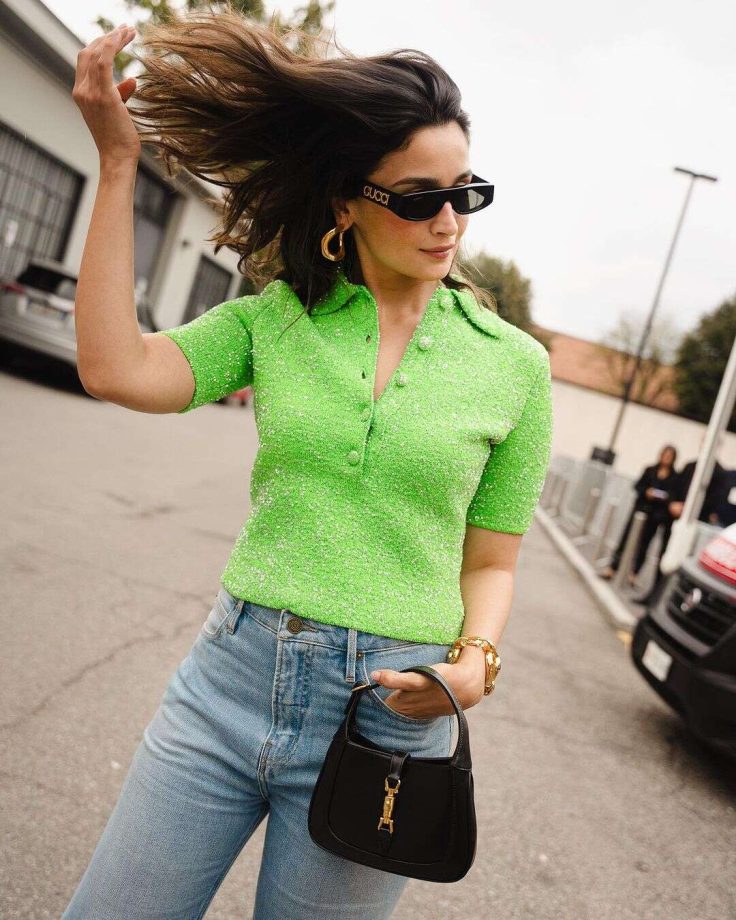 Gucci's Global Ambassador Alia Bhatt shines in green bling T-shirt and bell-bottom jeans at Milan Fashion Week 854625
