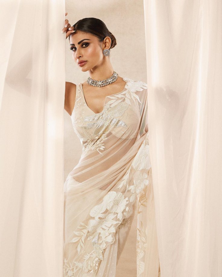 Mouni Roy And Esha Gupta Exude Glitter And Glamour In Ivory See-through Saree, Designer Blouse With Choker 851134