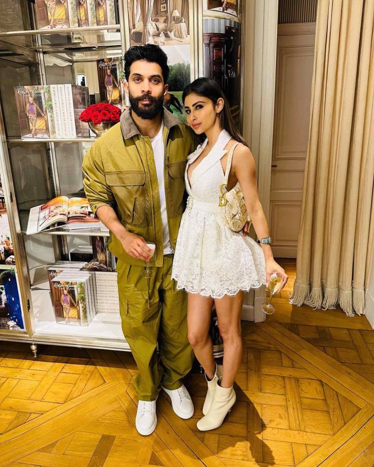 Mouni Roy Is Centre Of Attraction In White Plunge-neck Mini Dress With Boots Heels, Handbag 856768