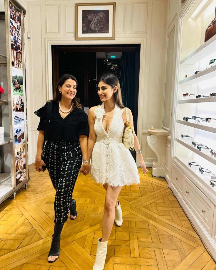 Mouni Roy Is Centre Of Attraction In White Plunge-neck Mini Dress With Boots Heels, Handbag 856761