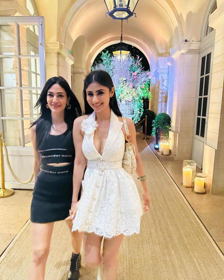 Mouni Roy Is Centre Of Attraction In White Plunge-neck Mini Dress With Boots Heels, Handbag 856762