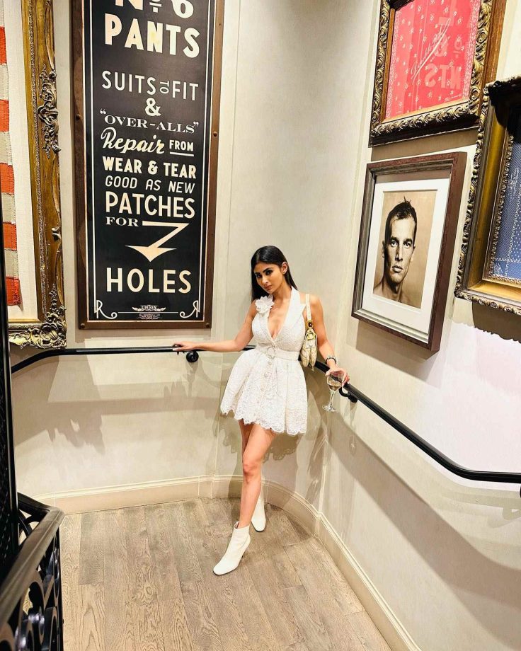 Mouni Roy Is Centre Of Attraction In White Plunge-neck Mini Dress With Boots Heels, Handbag 856765