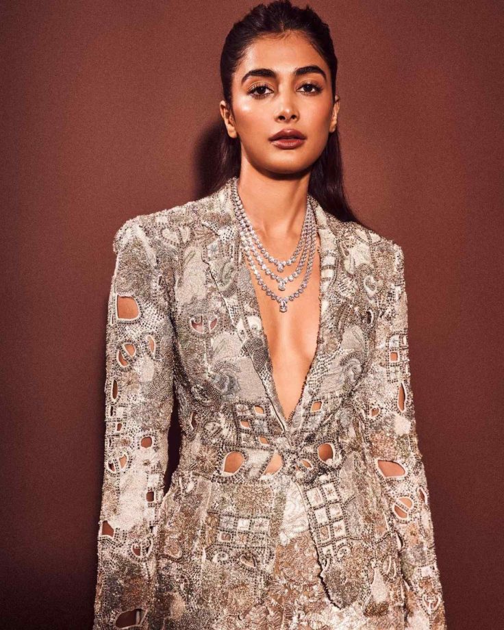 [Photos] Pooja Hedge Radiates Charm In Sparkling Silver Plunge-neckline Blazer And Trouser With Statement Accessories 851323