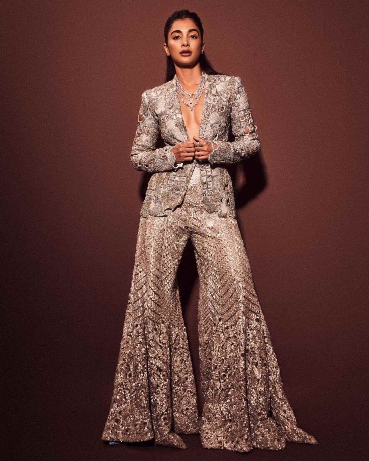 [Photos] Pooja Hedge Radiates Charm In Sparkling Silver Plunge-neckline Blazer And Trouser With Statement Accessories 851326