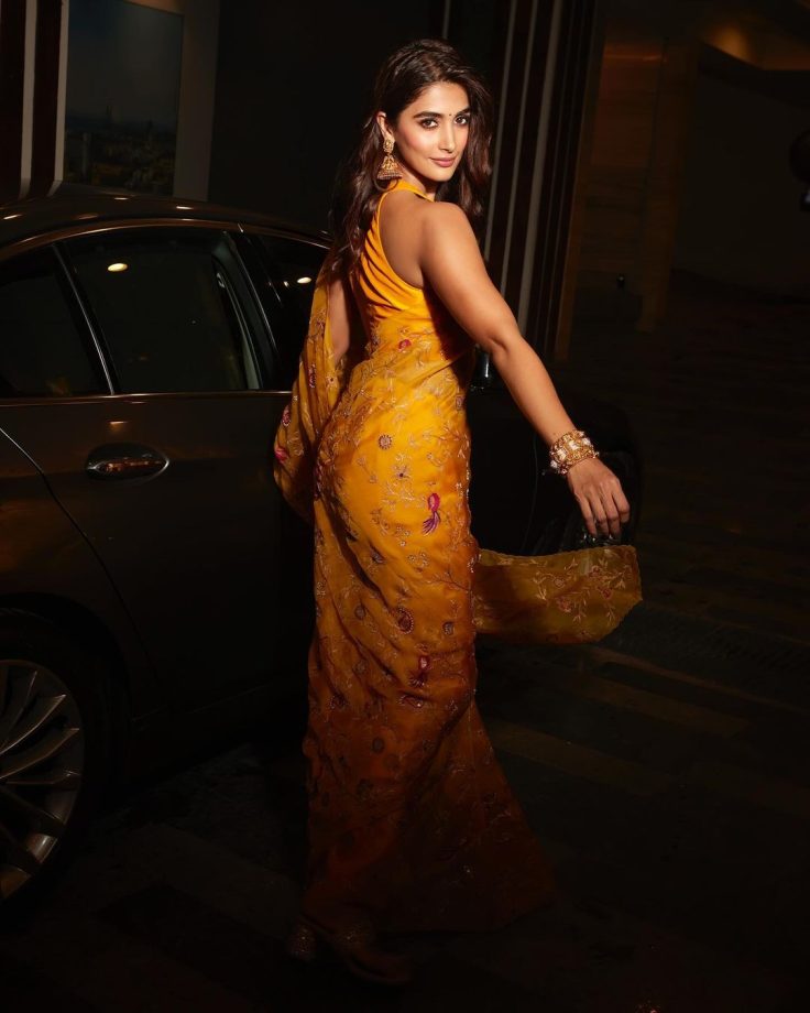 Pooja Hedge Shines In Floral Yellow Silk Saree And Halter-neck Blouse Design With Gold Jhumkas 855409