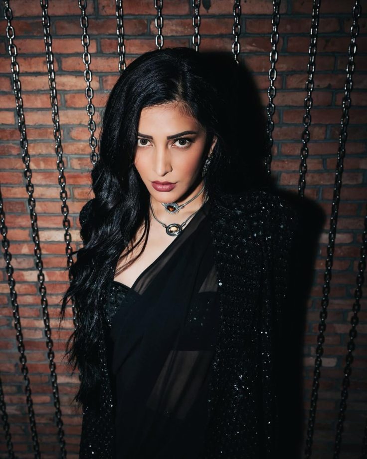 Shruti Haasan Looks OG Goth Girl In Black Saree, Low Neck Blouse Design, And Shimmery Jacket With Oxidised Accessories 854012
