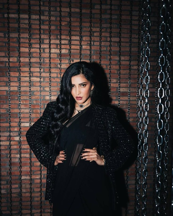 Shruti Haasan Looks OG Goth Girl In Black Saree, Low Neck Blouse Design, And Shimmery Jacket With Oxidised Accessories 854019