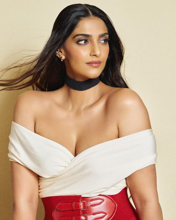 Sonam Kapoor Ups Sensuality Bar In Off-shoulder Wrap Top, Knit Maxi Skirt And Long Boots 850648