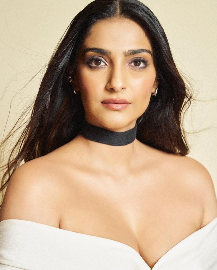 Sonam Kapoor Ups Sensuality Bar In Off-shoulder Wrap Top, Knit Maxi Skirt And Long Boots 850651