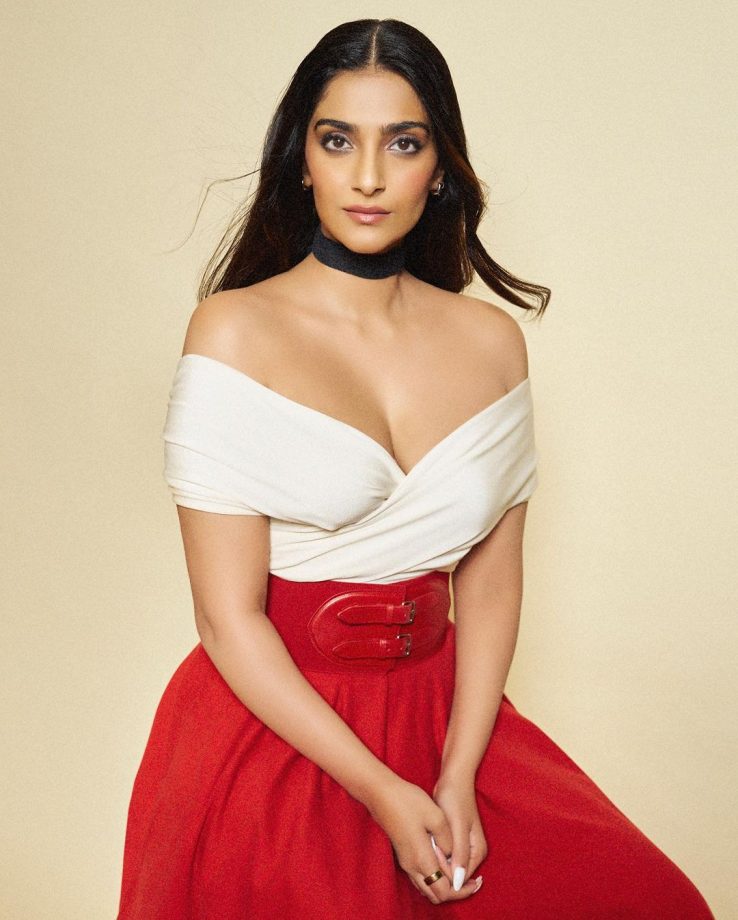 Sonam Kapoor Ups Sensuality Bar In Off-shoulder Wrap Top, Knit Maxi Skirt And Long Boots 850653