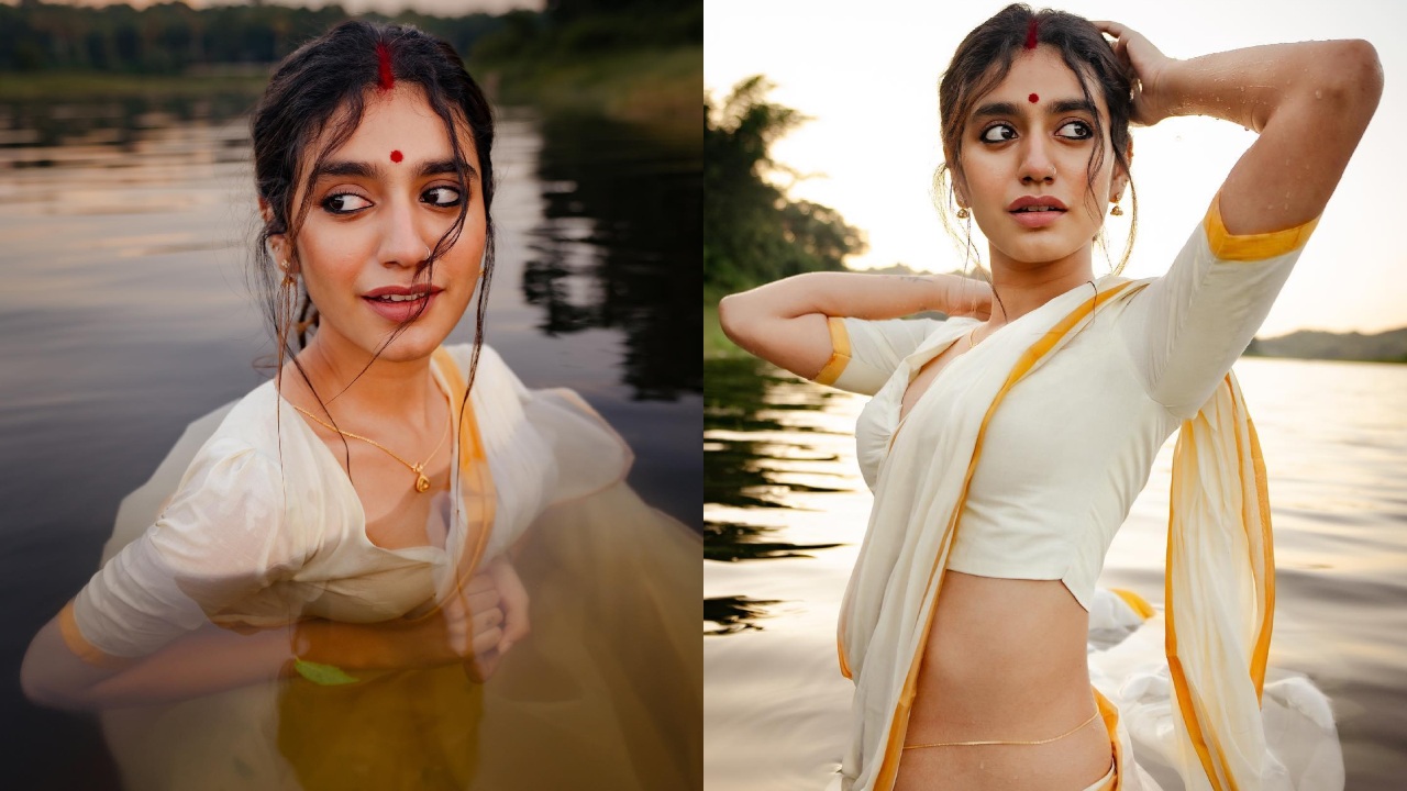 In Photos: Priya Varrier Looks Sizzling In Traditional White Saree As She Poses Inside Lake 861704