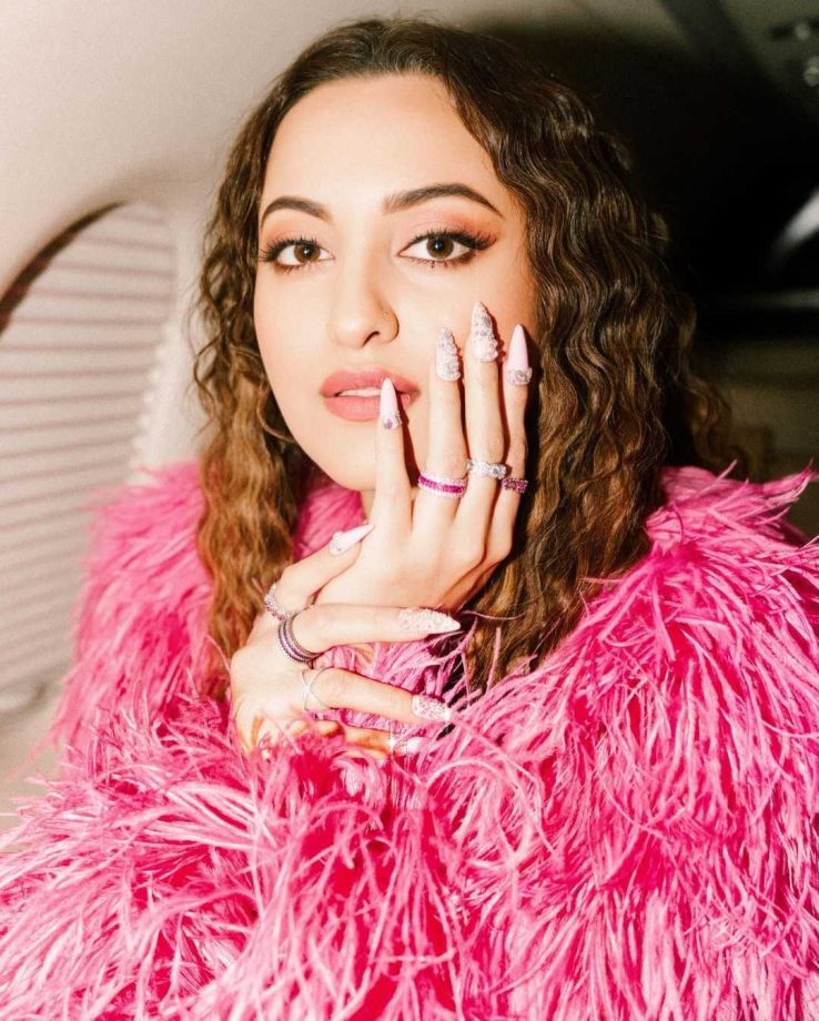 ‘Kalaastar’ Sonakshi Sinha slips in magenta pink sequined high-thigh slit gown and ostrich feather coat 861833