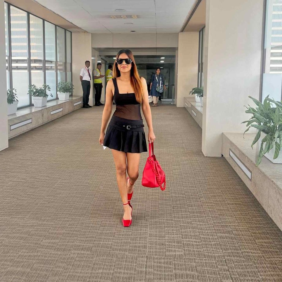 Nia Sharma slays the airport look with elegance in all black dress 865059