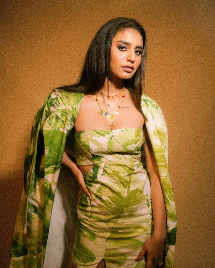 Glamorously Green! Priya Prakash Varrier looks classy in green floral short dress and trench coat 868166