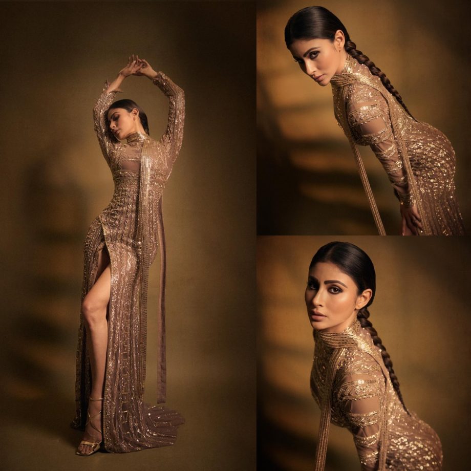 Mouni Roy goes all shine in golden embroidered high-thigh slit gown 870354