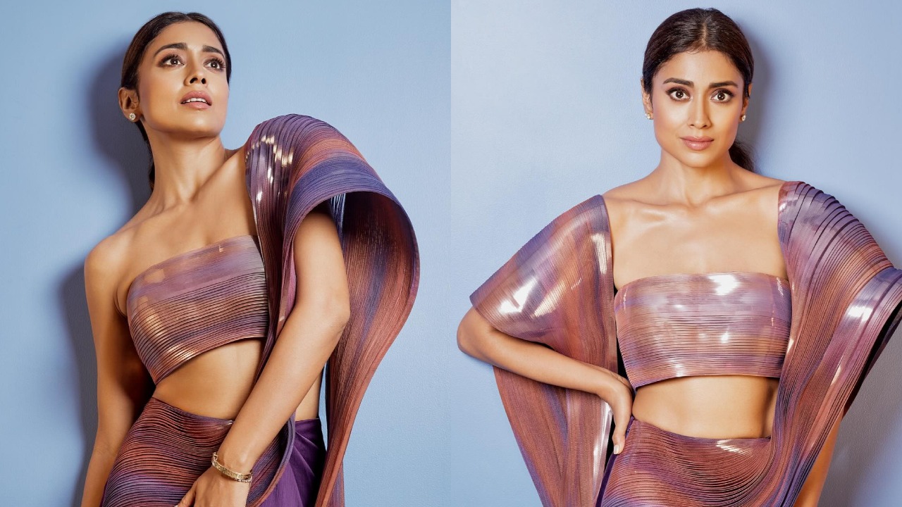 Shriya Saran twirls in contemporary flair in metallic structured saree