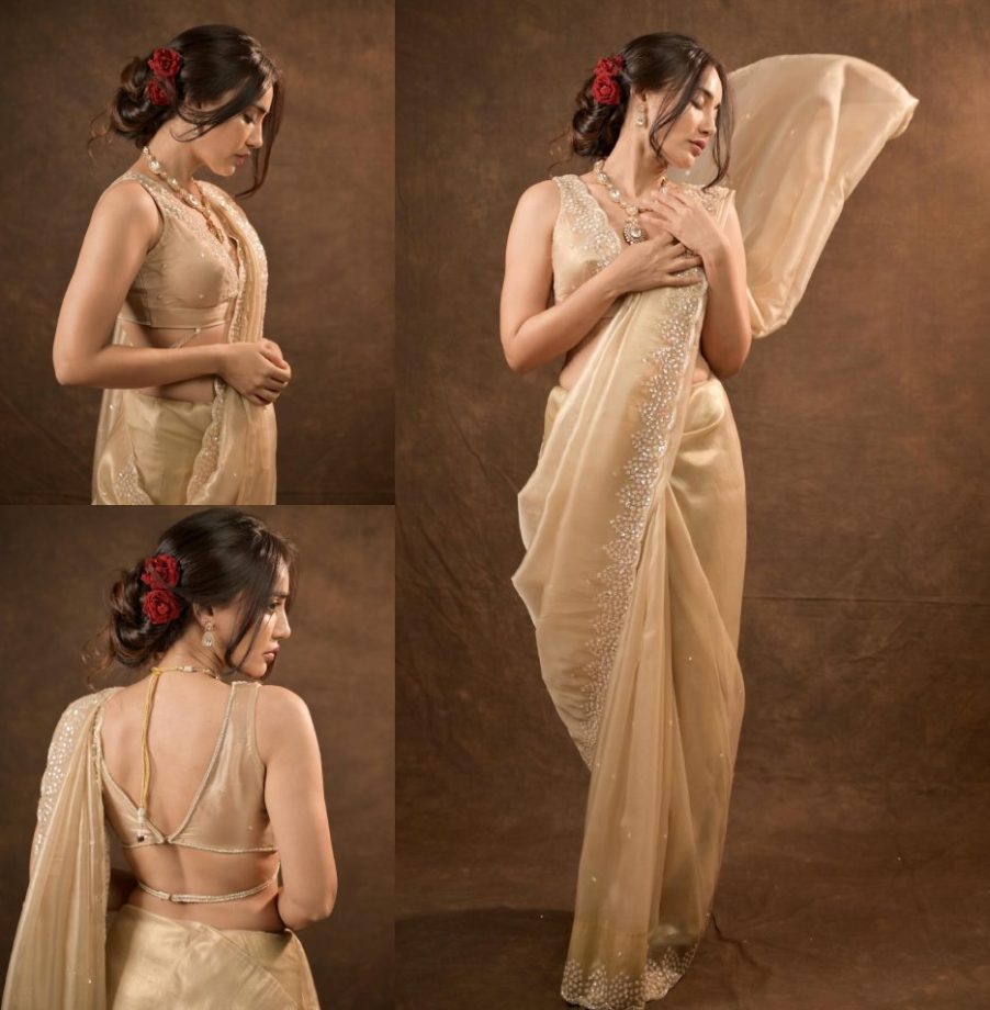 Surbhi Jyoti turns muse in beige sequinned saree and floral bun, check out 873594