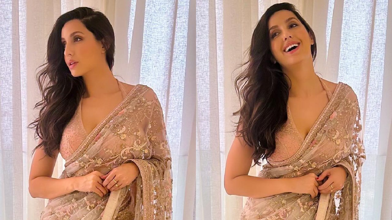 Nora Fatehi Looks Like Dream Girl In Ivory Embellished Saree With Halter Blouse