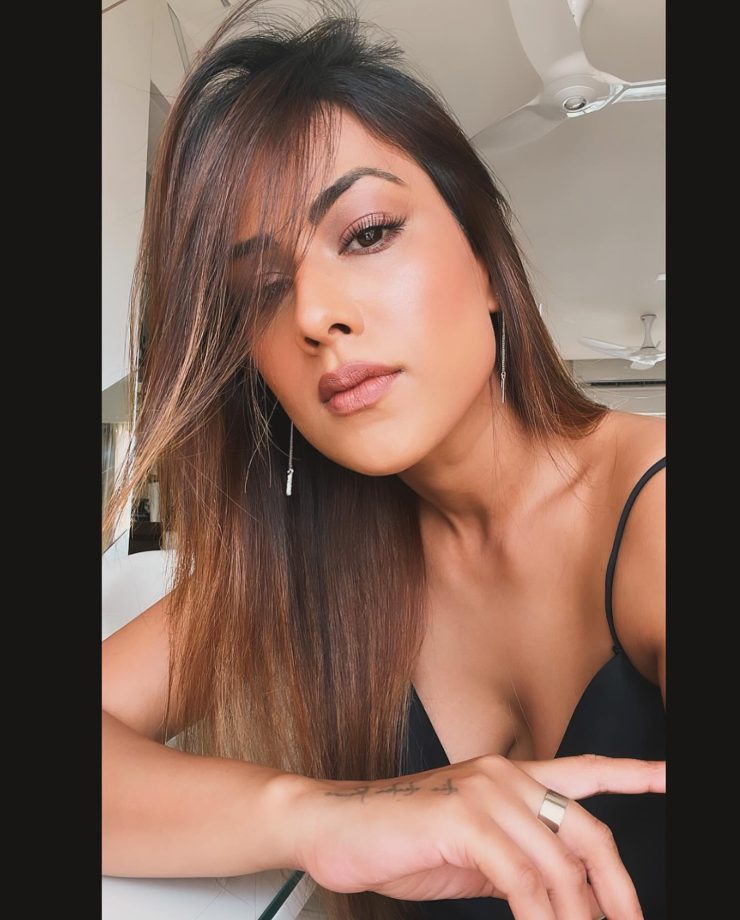 Gorgeous: Nia Sharma stuns in plunge neck satin LBD 877040