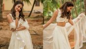 Pooja Hegde turns princess in coconut white minimal lehenga set [Photos]